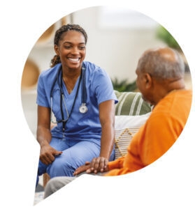 A clinician having a consultation with a patient in a nursing home